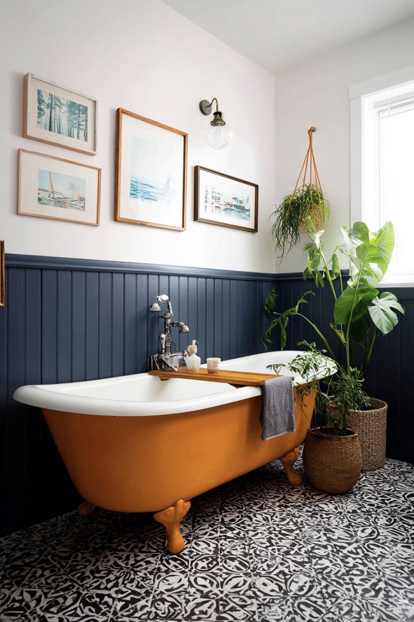 3. Orange Claw-foot Statement Bathroom
