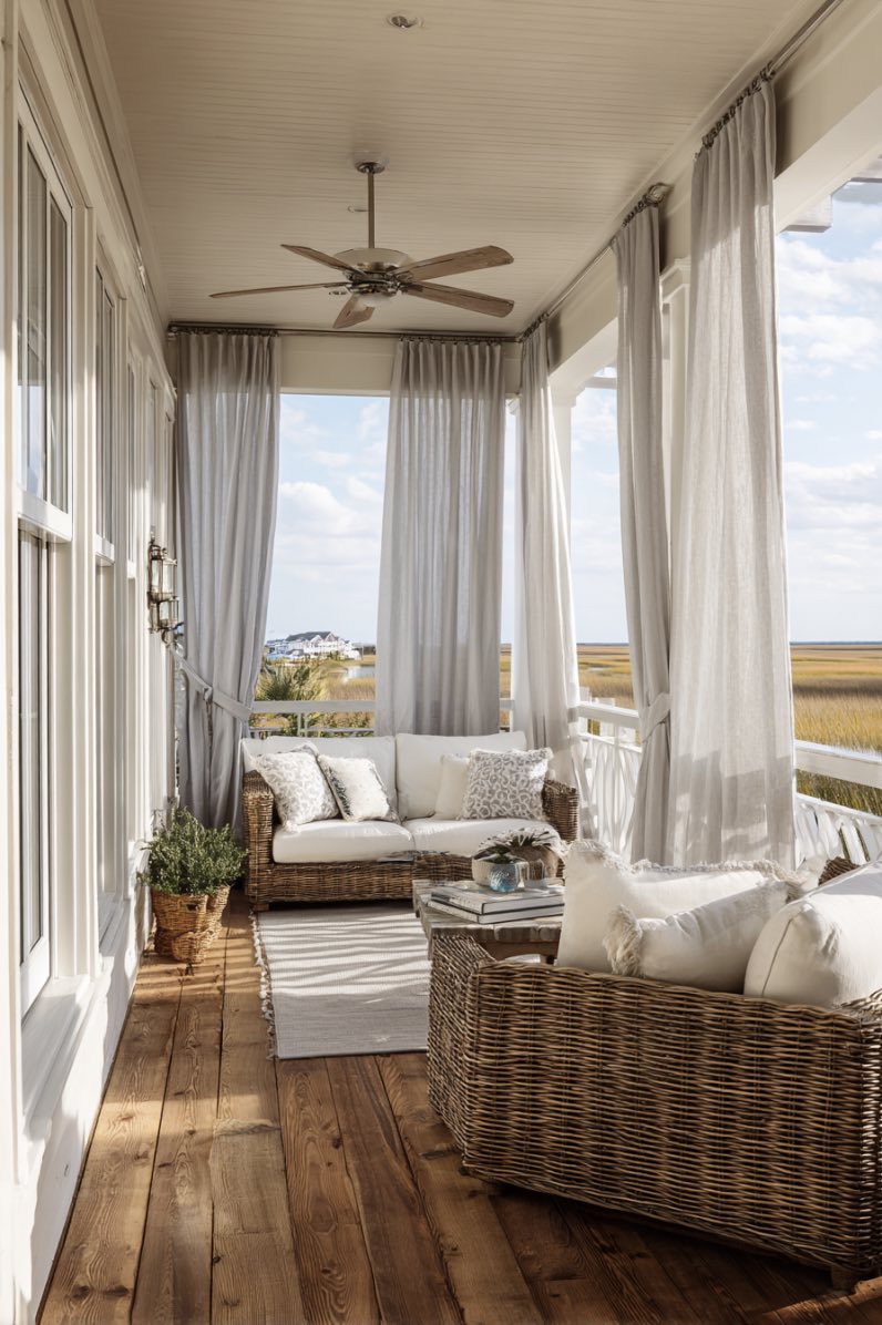 Coastal Calm with Soft Curtains and Wicker